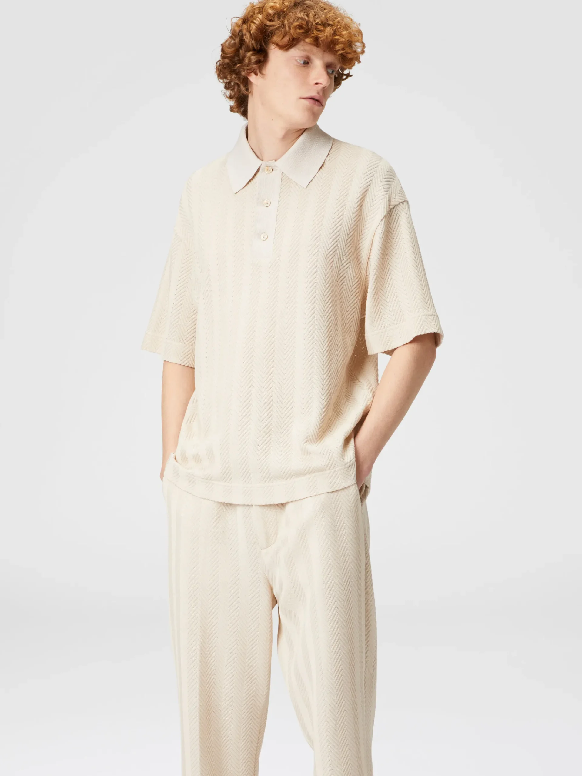 Boxy-fit knit polo shirt with tone-on-tone chevron