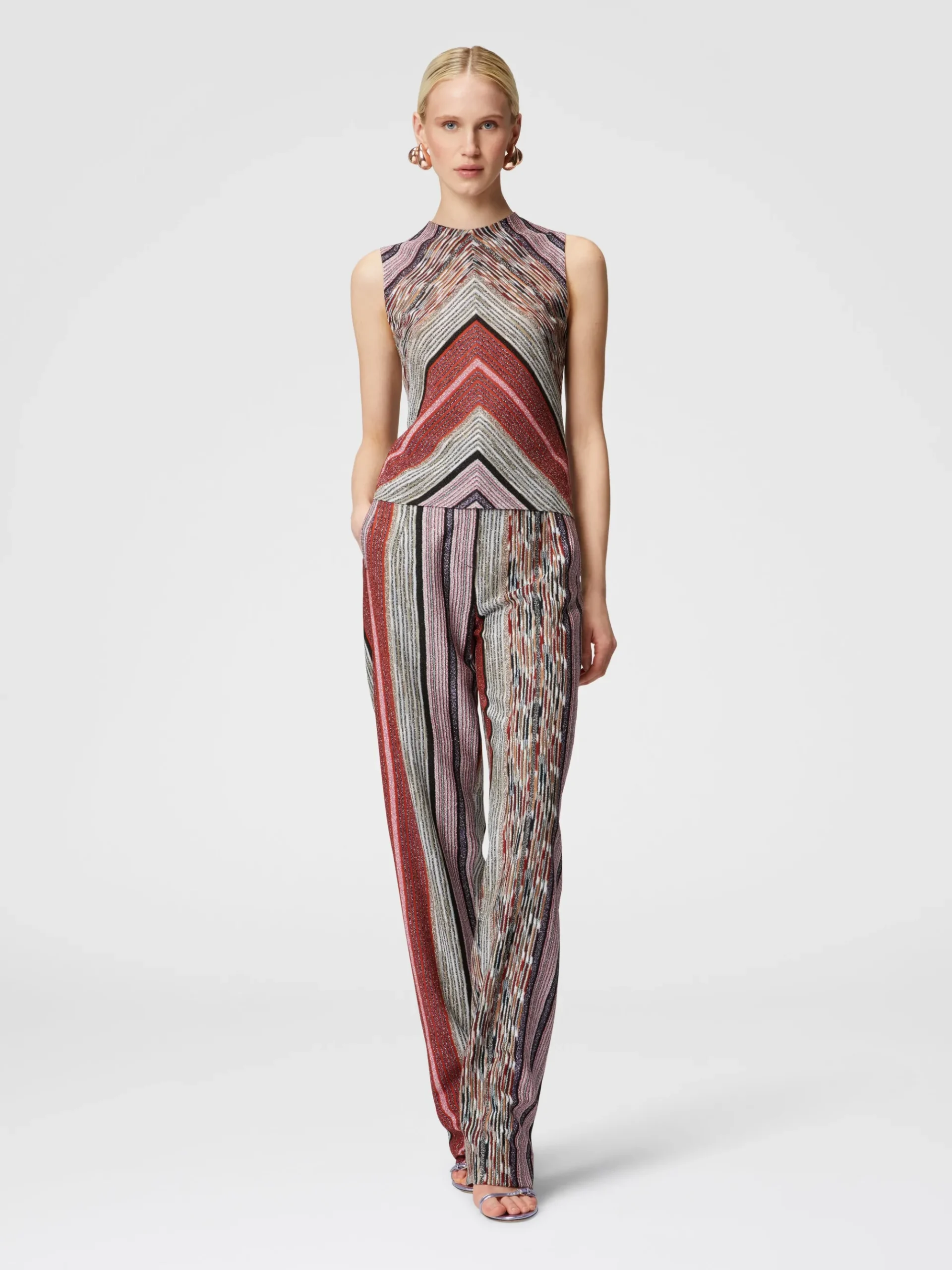 Carrot-fit trousers in lamé striped viscose