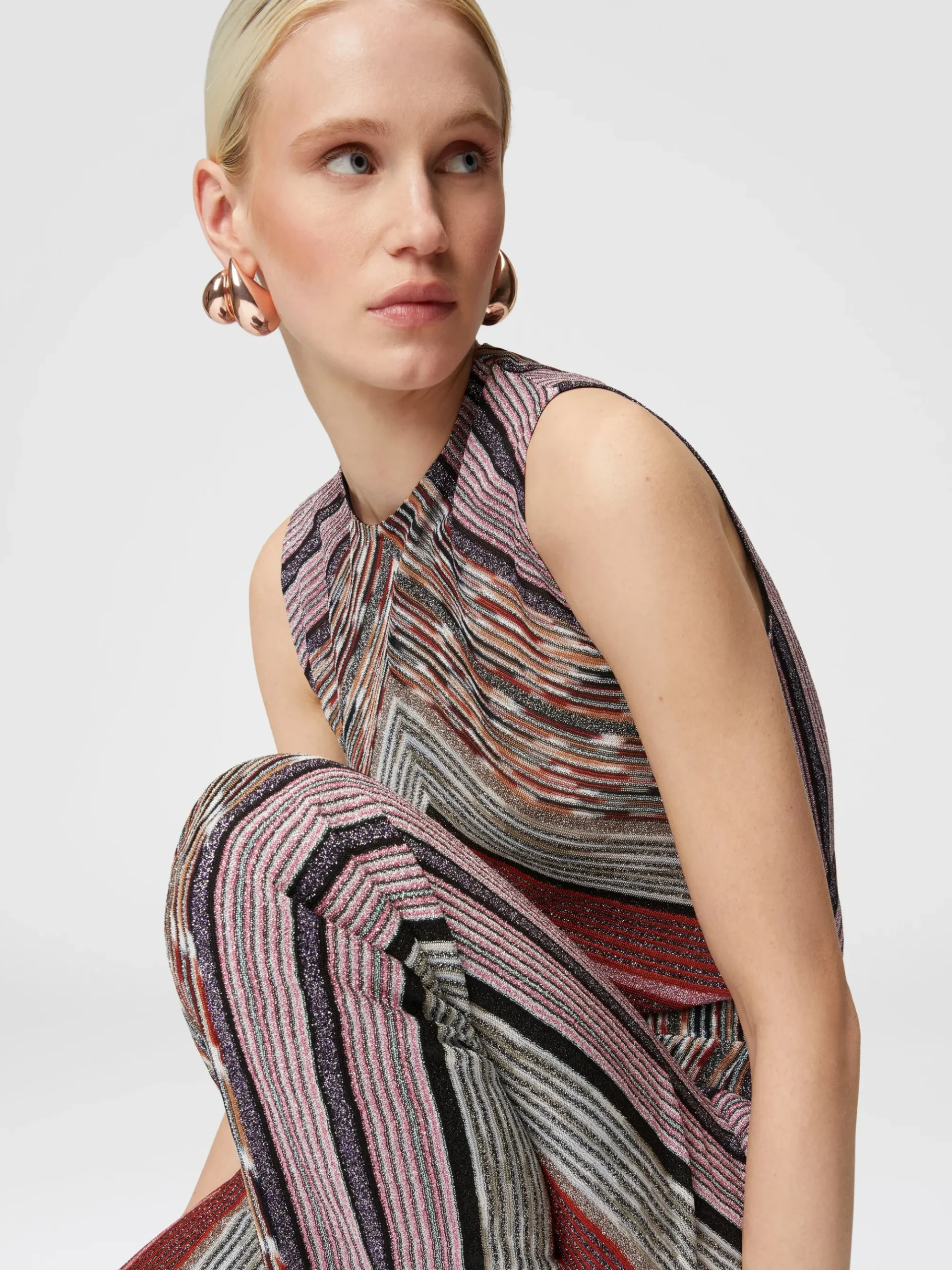 Carrot-fit trousers in lamé striped viscose