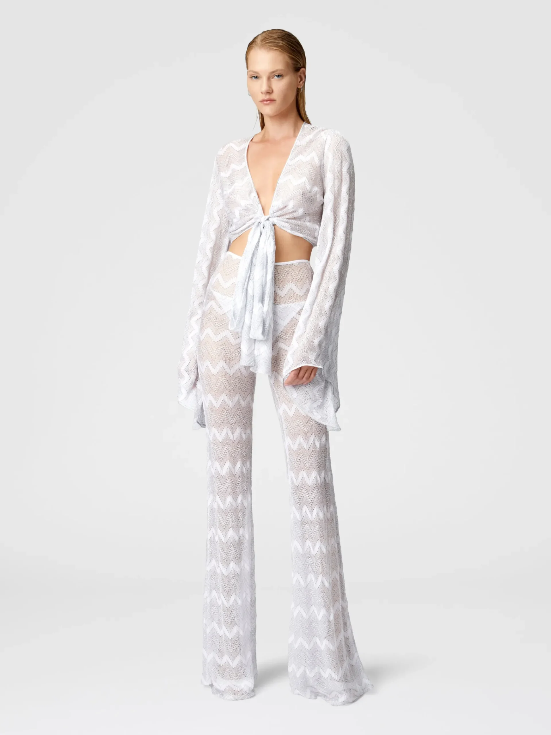 Crop top with wide sleeves and front knot in zig zag lamé viscose