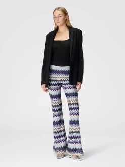 Flare trousers in zig zag lamé viscose