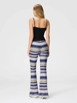 Flare trousers in zig zag lamé viscose