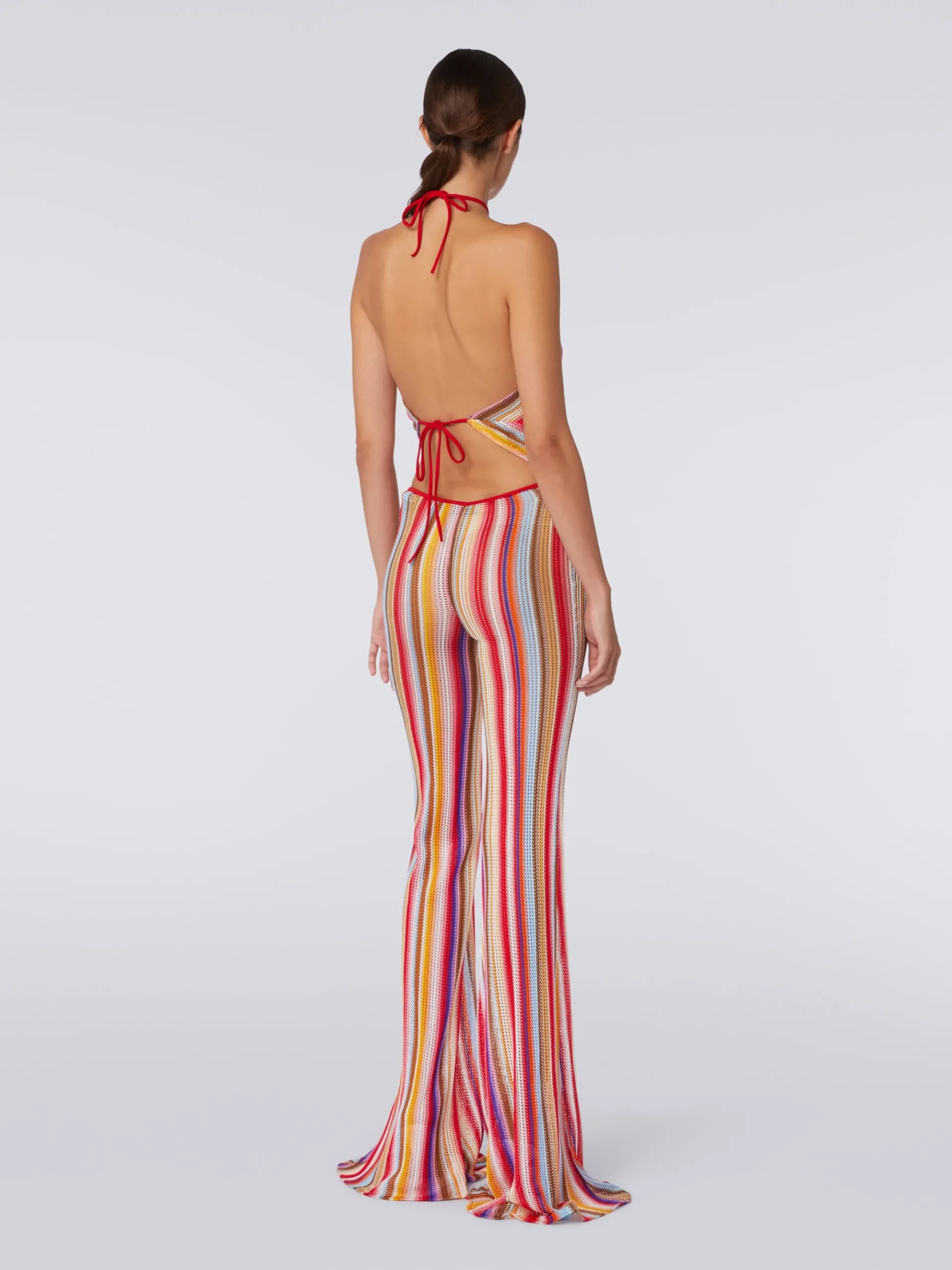 Flared trousers in striped crochet