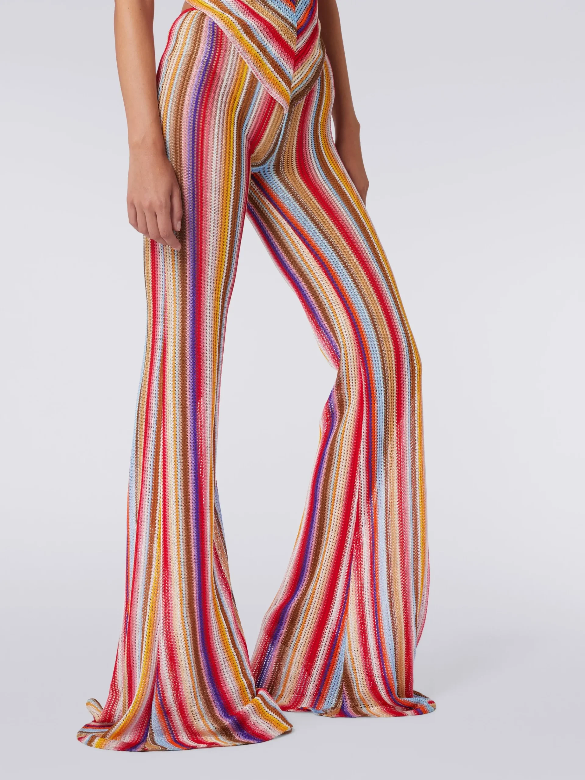 Flared trousers in striped crochet