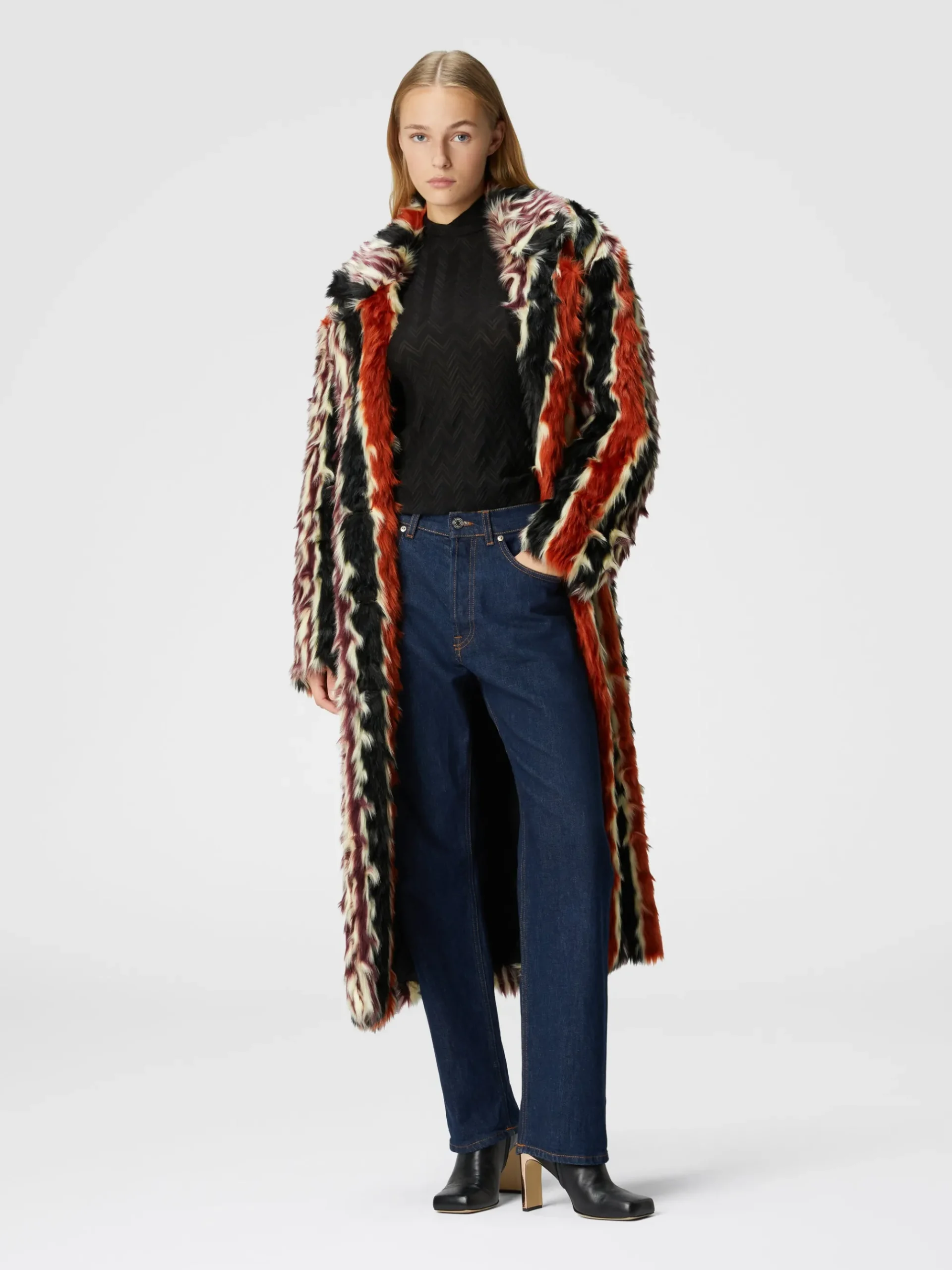 Long coat in striped faux fur