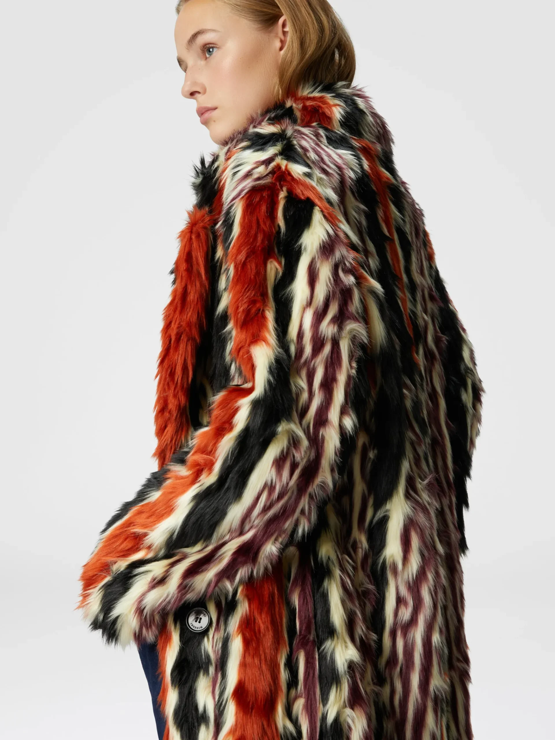 Long coat in striped faux fur