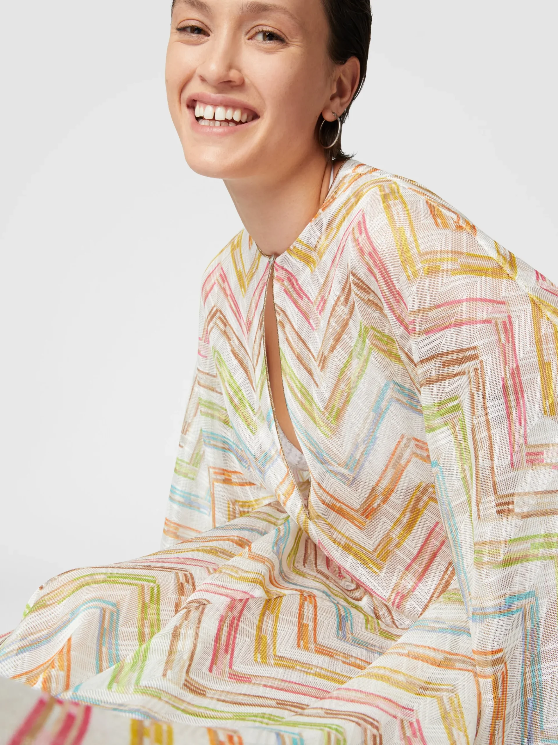 Long covered up in printed tulle with batwing sleeves