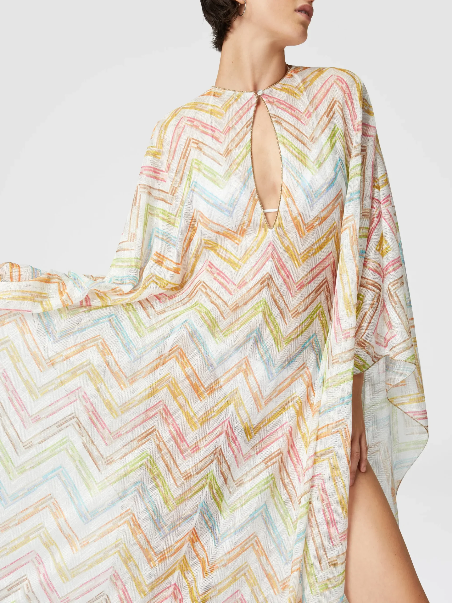 Long covered up in printed tulle with batwing sleeves