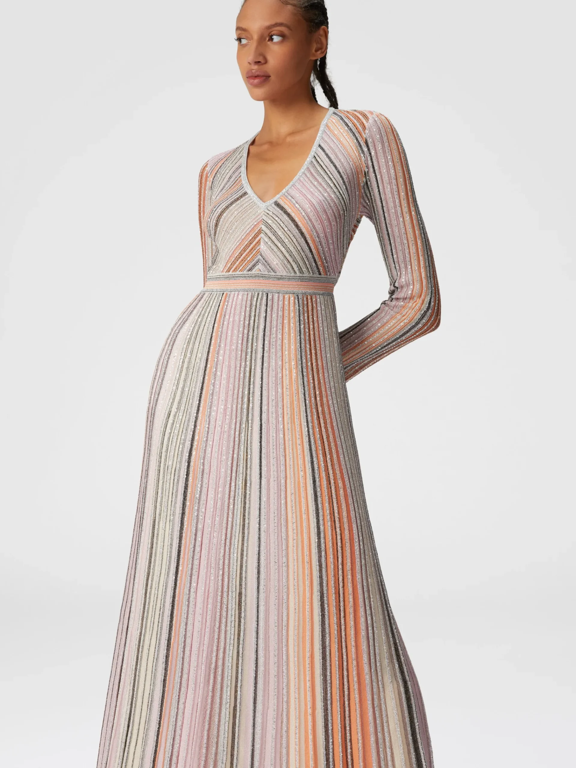 Long dress in lamé pleated knit