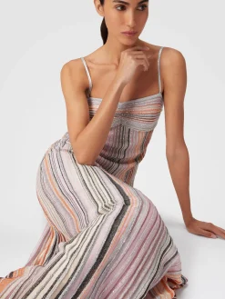 Long sleeveless dress in lamé pleated knit
