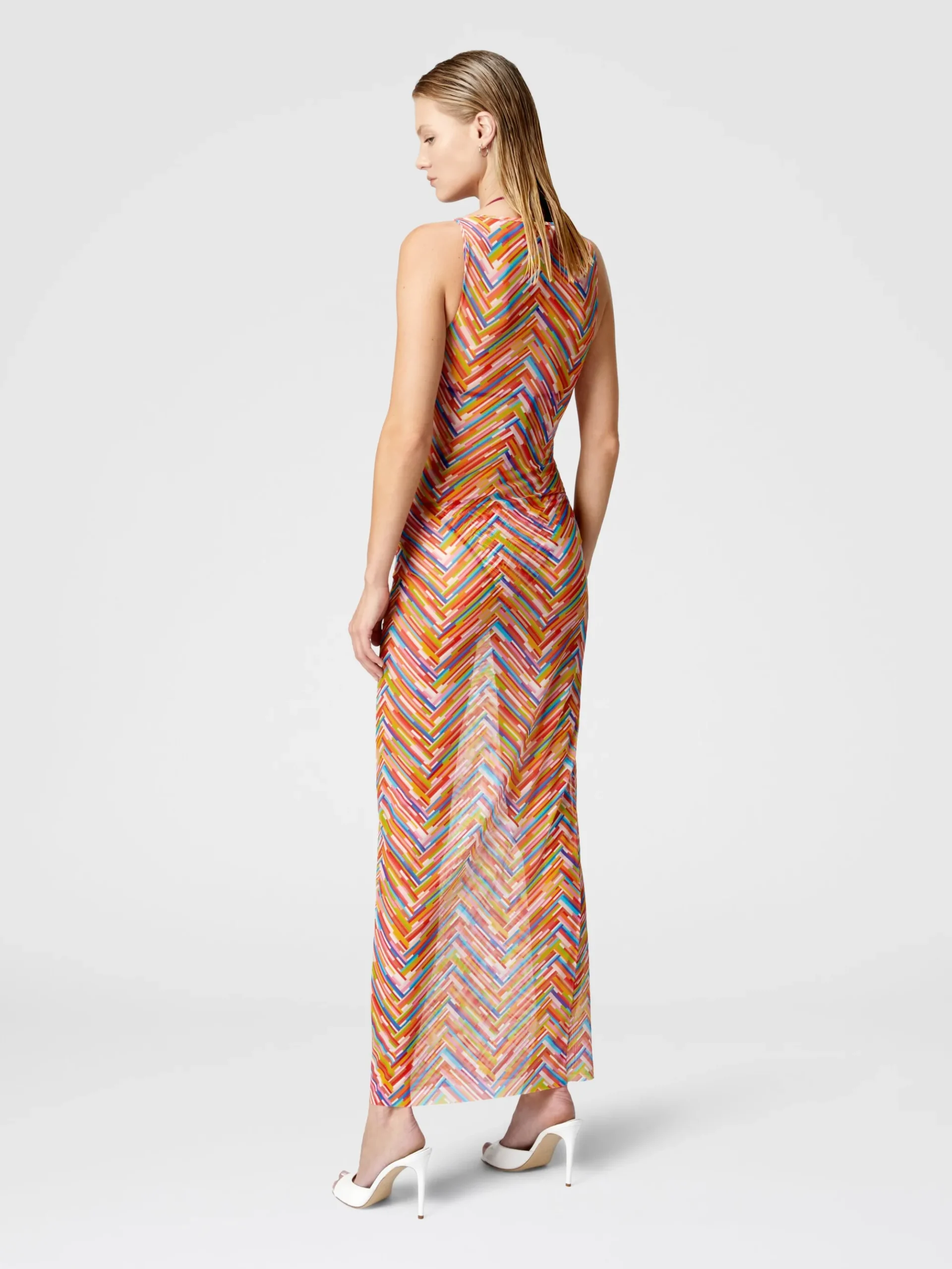 Long sleeveless dress in printed tulle