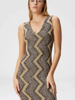 Long zig zag dress with plunging neckline and sequins