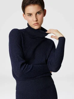 Long-sleeved turtleneck sweater with chevron pattern