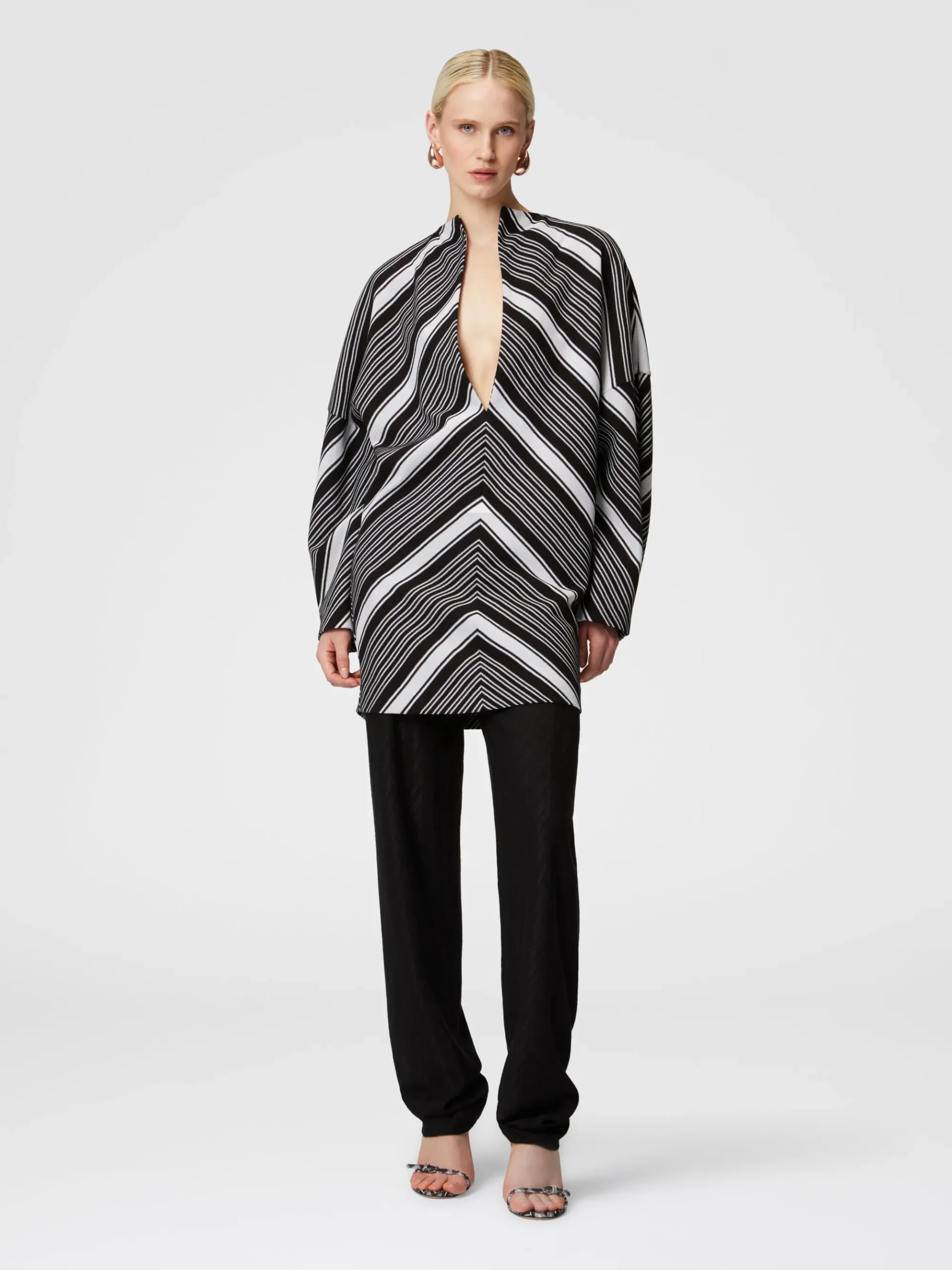 Mini-dress with oversized sleeves and plunging V-neckline