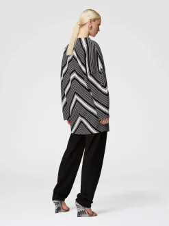 Mini-dress with oversized sleeves and plunging V-neckline
