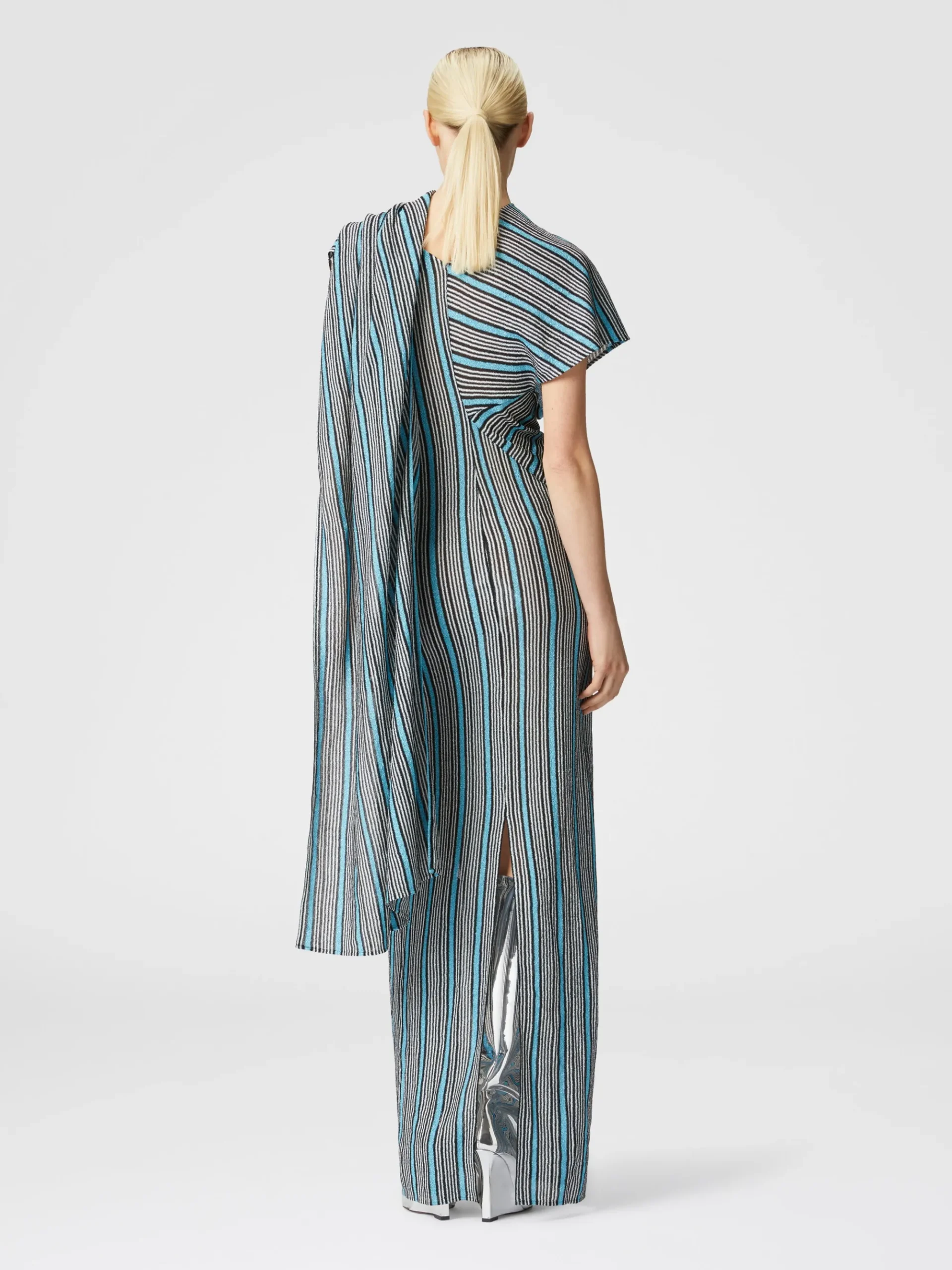 Peplum-cut dress in lamé viscose with side slit