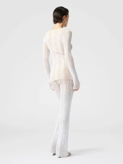 Ribbed mini-dress with sequins and long sleeves