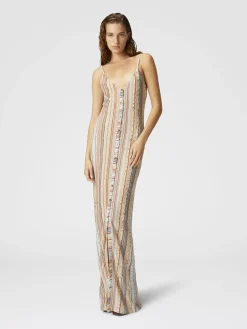 Sleeveless dress with zig zag lamé fret and central button placket