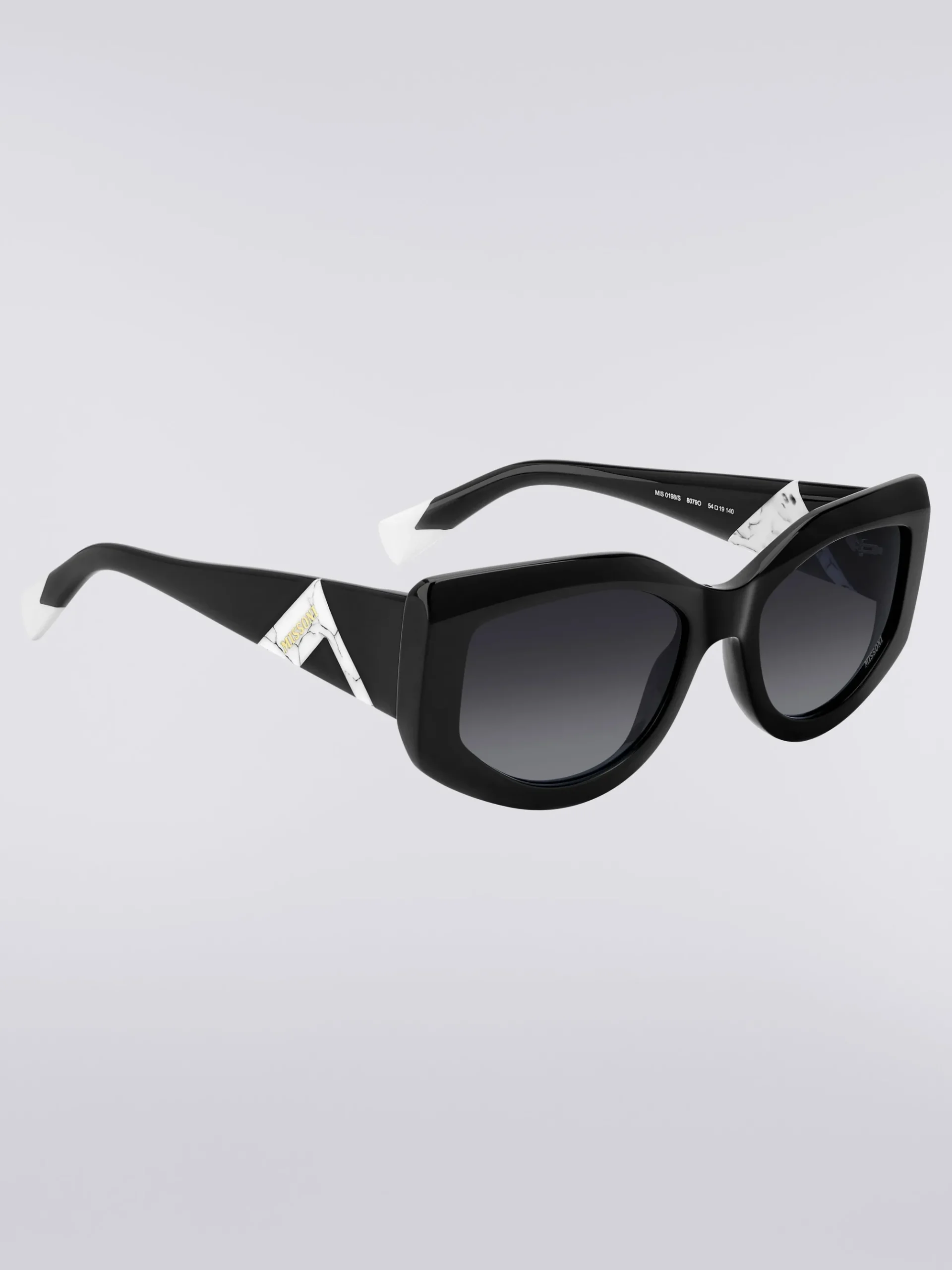 Slightly wrap-around shaped sunglasses in acetate