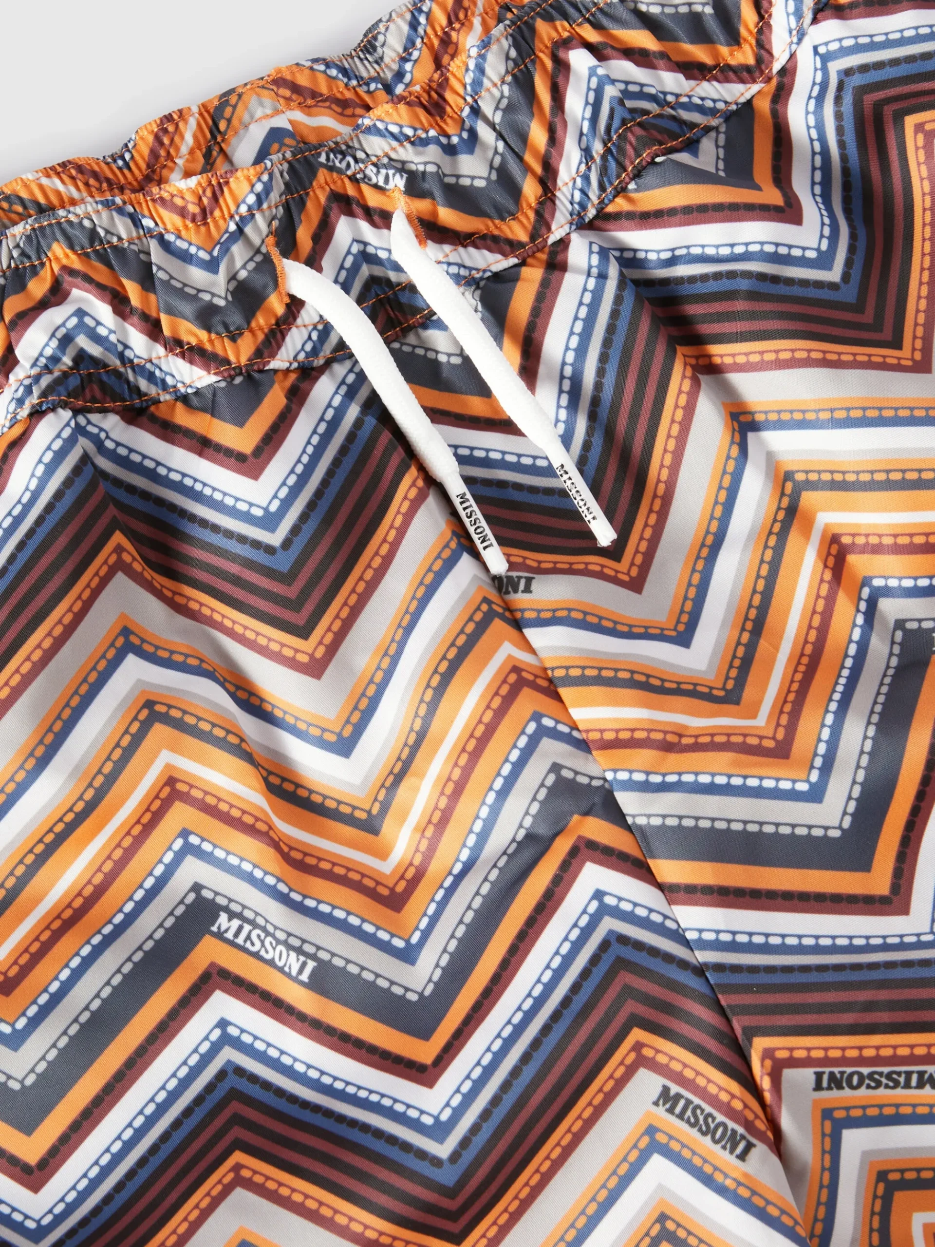 Swim shorts with zig zag print and logo