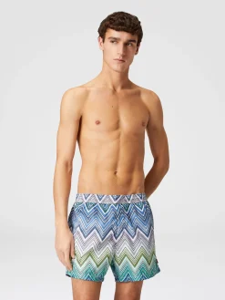 Swimming trunks with large zigzag print