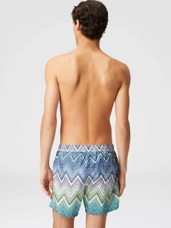 Swimming trunks with large zigzag print
