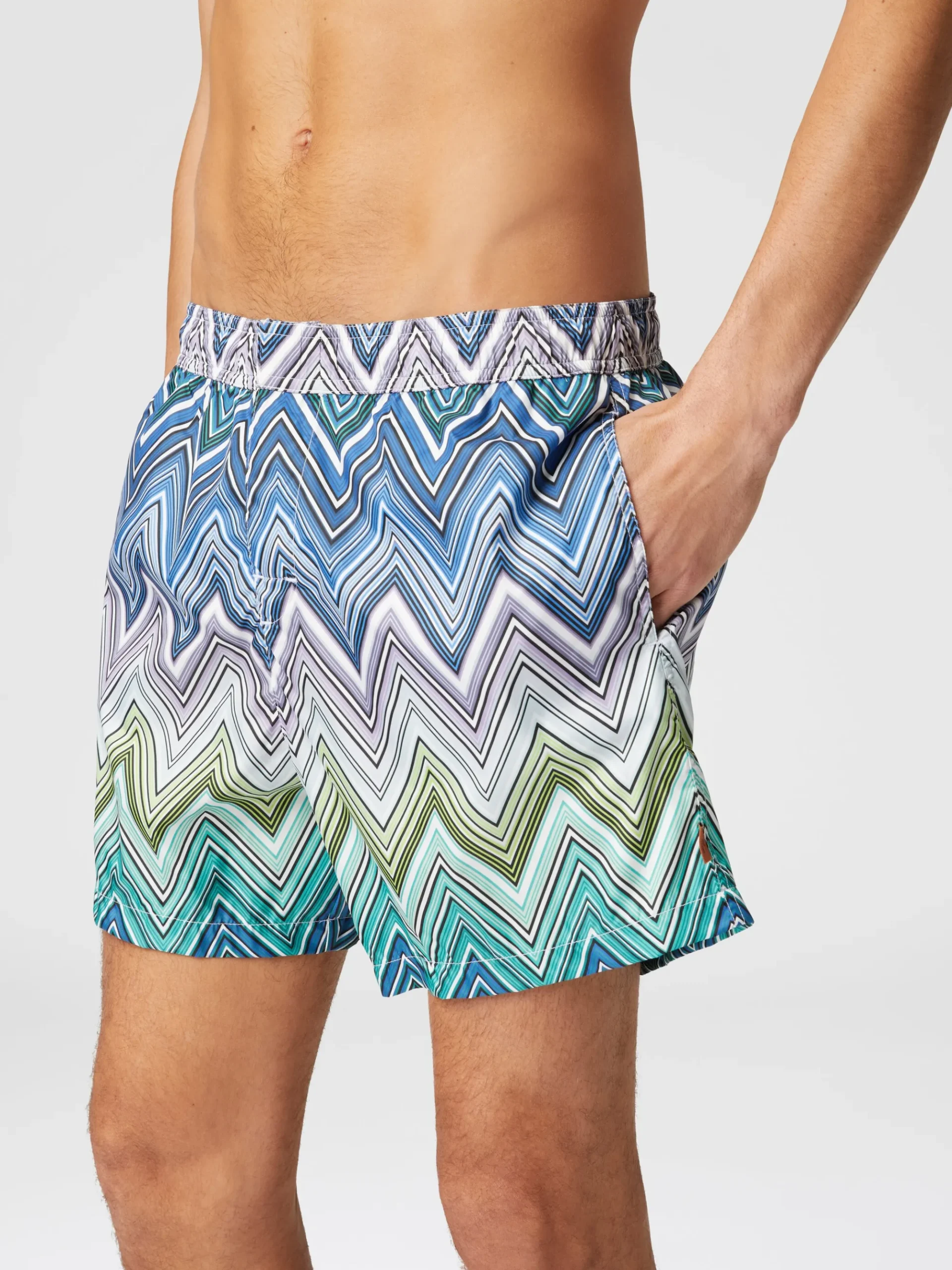 Swimming trunks with large zigzag print