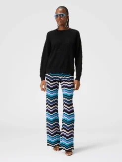 Trousers with Greek zig zag motif in viscose and wool