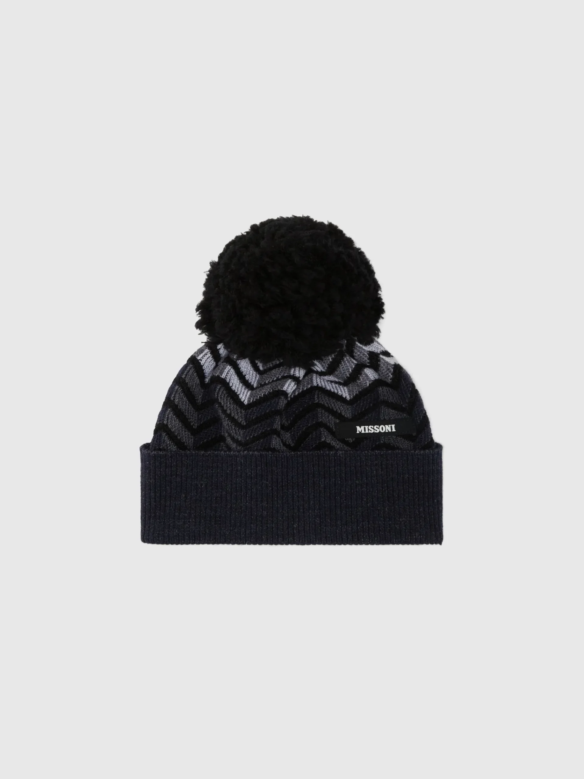 Zig zag virgin wool hat with logo and pom pom