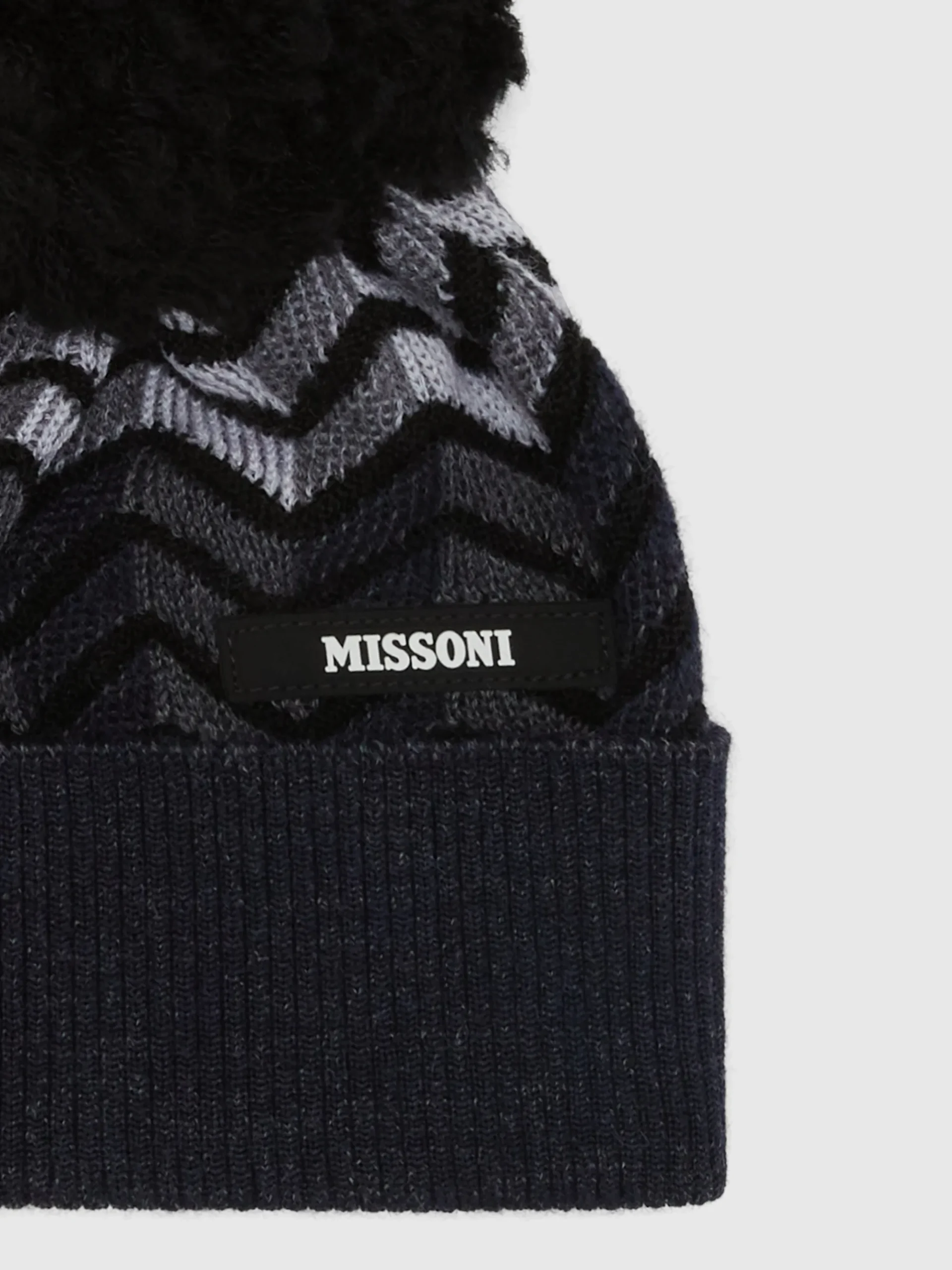 Zig zag virgin wool hat with logo and pom pom
